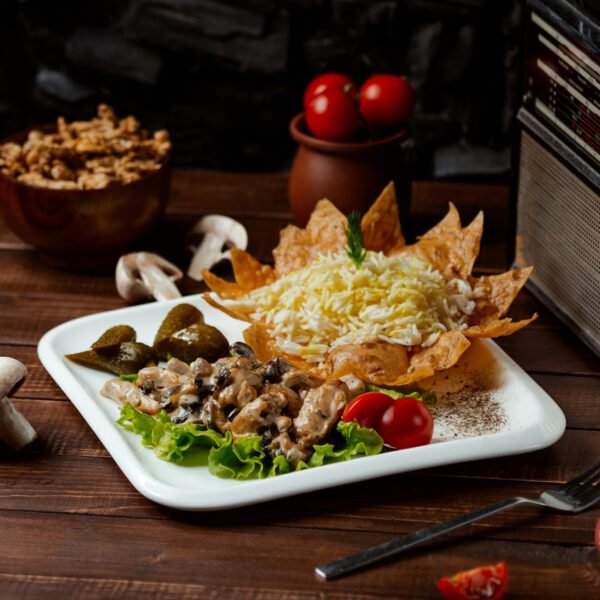 fried meat with mushrooms and rice